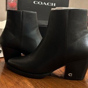 NWT coach black heeled boots.